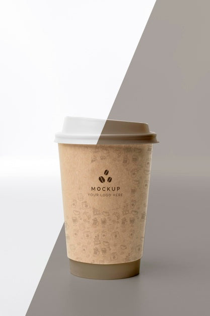 Free Plastic Cup With Coffee Mock Up On Table Psd