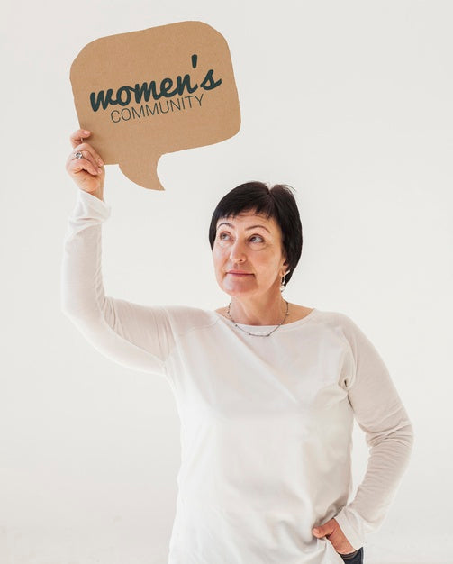 Free Portrait Of Senior Woman Holding Mock-Up Sign Psd