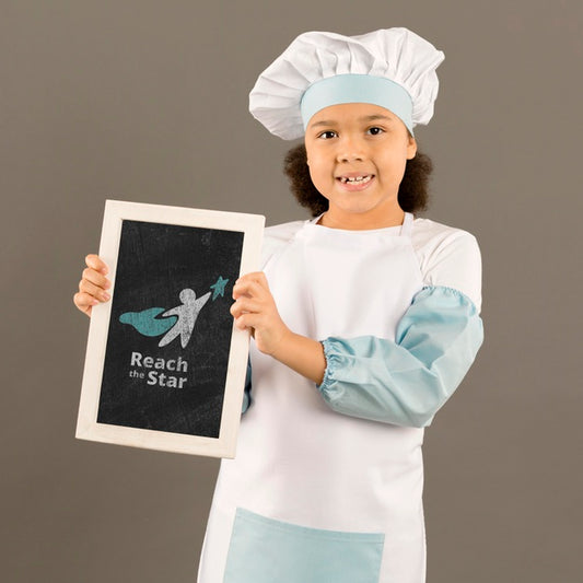 Free Portrait Of Young Girl Posing As Chef Psd