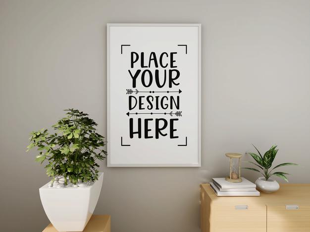 Free Poster Frame Mockup On The Wall With Plant Psd