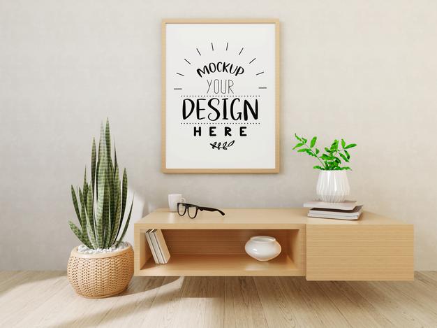 Free Poster Frame Mockup On The Wall With Plant Psd