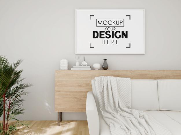 Free Poster Frame Mockup On The Wall With Plant Psd