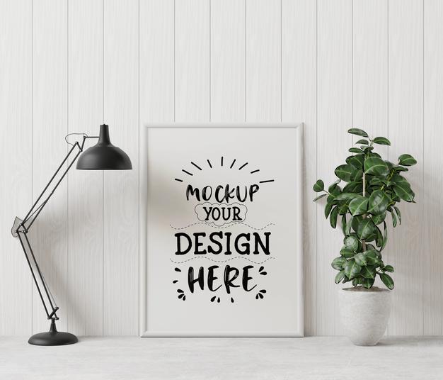 Free Poster Frame Mockup On The Wall With Plant Psd