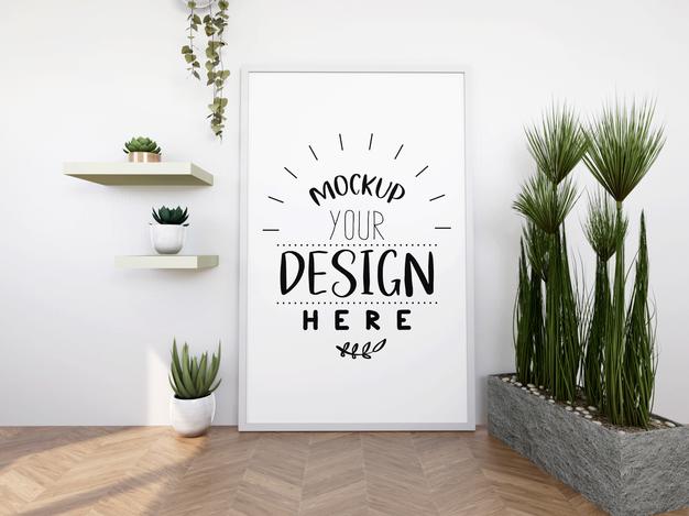 Free Poster Frame Mockup On The Wall With Plant Psd