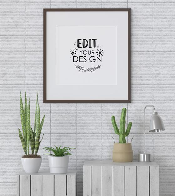 Free Poster Frame Mockup On The Wall With Plant Psd