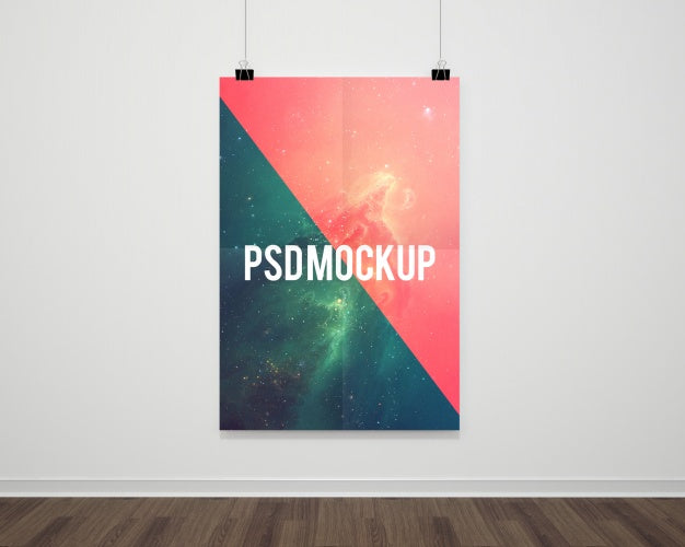Free Hanging Poster on a White Wall Mockup