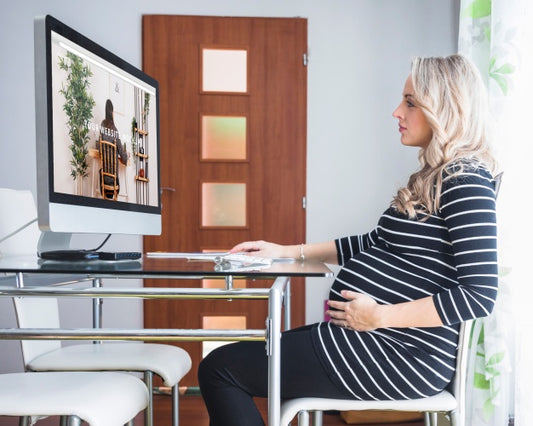 Free Pregnant Woman Using Computer Psd