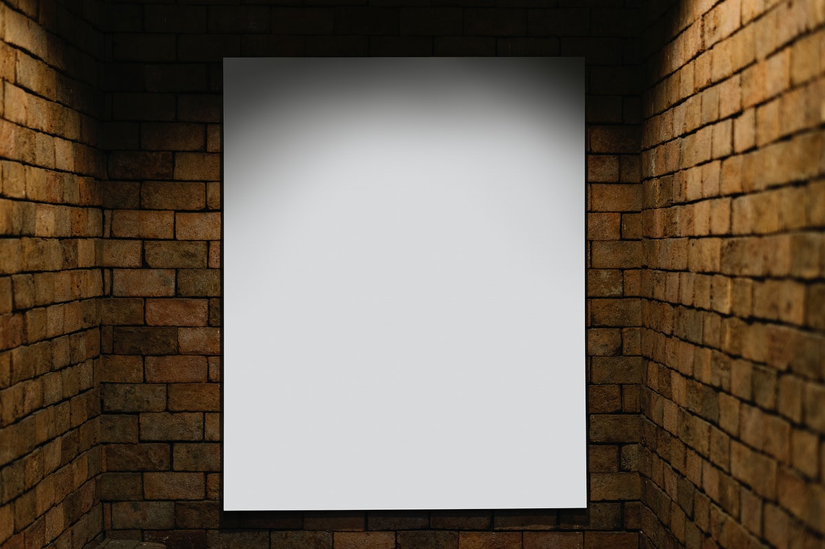 Free Projector Mockup Against A Brick Wall