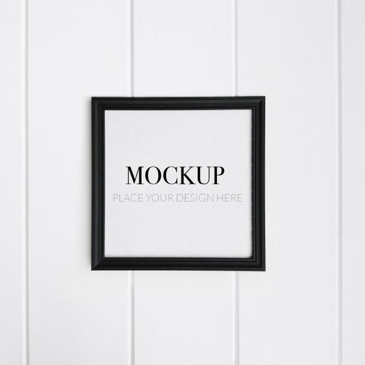 Free Realistic Black Frame On White Wall For Mockup Psd
