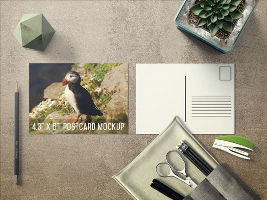 Free Realistic Postcard On Desktop Mock Up Psd