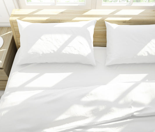 Free Realistic White Pillows On A Double Bed Psd