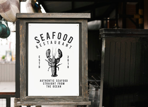 Free Rustic Style Sign Mockup At A Seafood Restaurant Psd