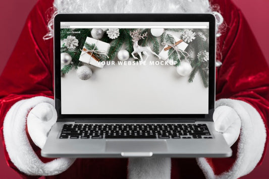 Free Santa Presenting Laptop Mockup Psd