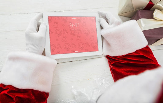 Free Santa Using Tablet Psd
