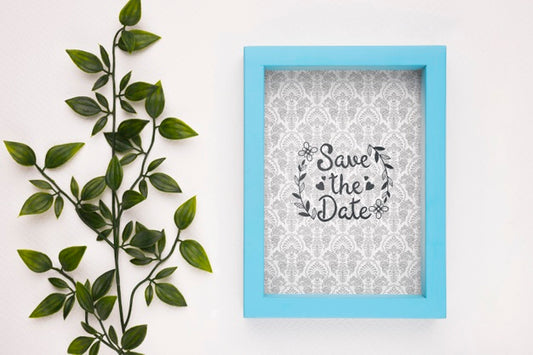 Free Save The Date Mock-Up Blue Frame And Plant Psd