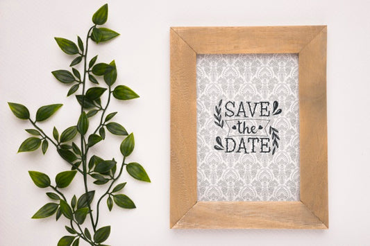 Free Save The Date Mock-Up Wooden Frame And Plant Psd
