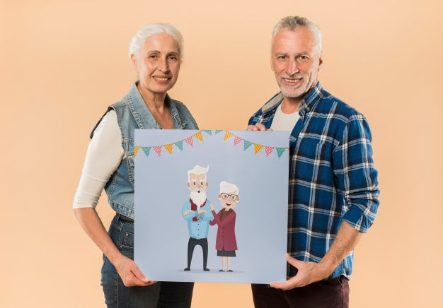 Free Senior Couple Presenting Board For Grandparents Day Psd