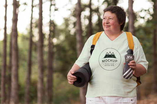 Free Senior Woman At Camping With A Mock-Up T-Shirt Psd