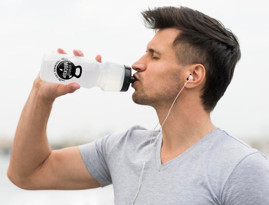 Free Side View Of Man Drinking Water After Working Out Psd