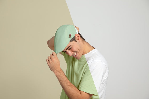 Free Side View Of Man Touching His Cap Psd
