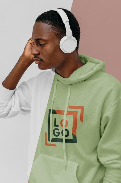 Free Side View Of Stylish Man In Hoodie With Headphones Psd