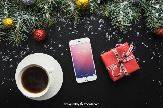 Free Smartphone And Coffee Mockup With Christmas Design Psd