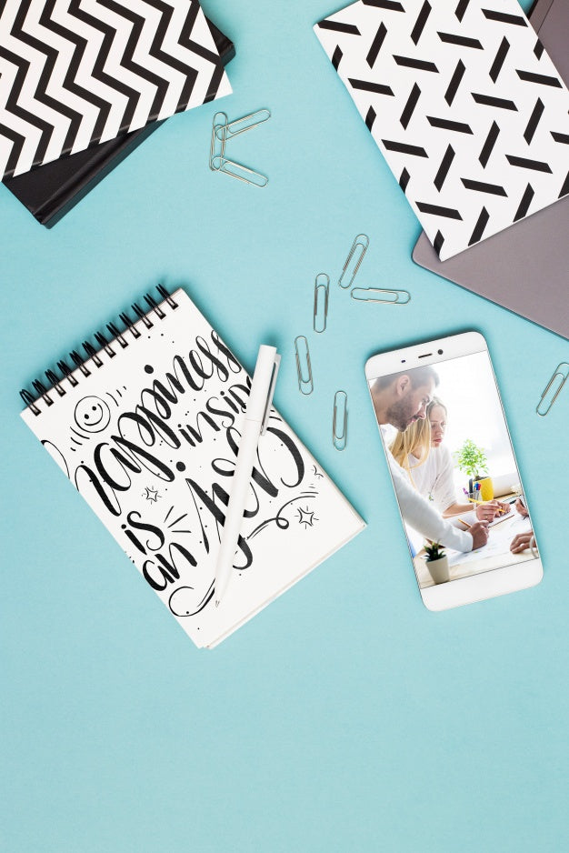 Free Smartphone And Notepad Mockup Psd