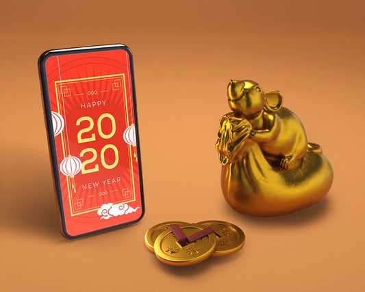 Free Smartphone Beside Golden Statue For New Year Psd