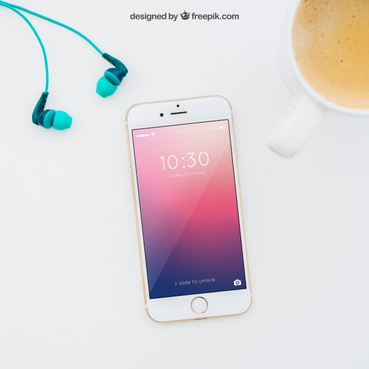 Free Smartphone Mockup With Earphones And Coffee Psd