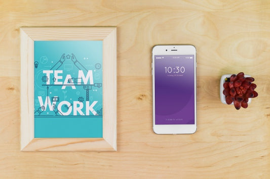 Free Smartphone Mockup With Office Materials On Table Psd