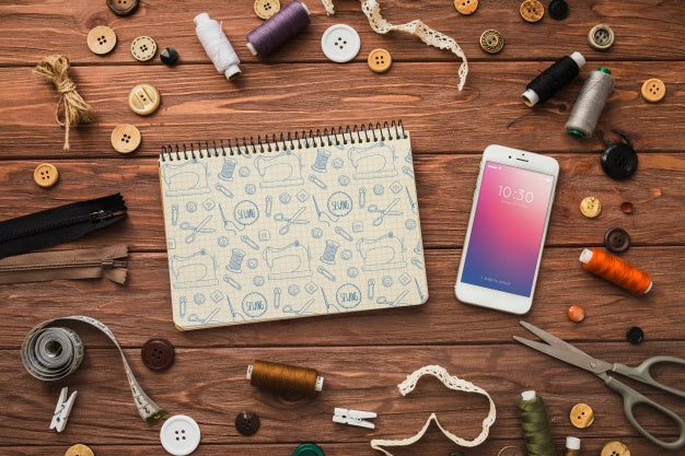 Free Smartphone Mockup With Sewing Concept Psd