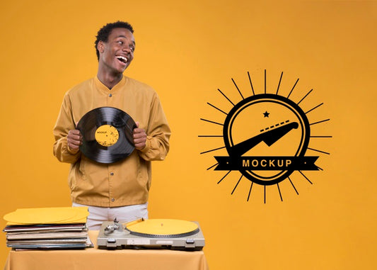 Free Smiley Man Holding Vinyl Disk For Music Store Mock-Up Psd