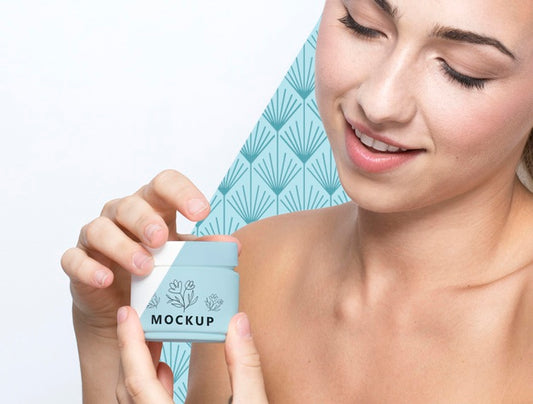 Free Smiley Woman Holding A Skincare Product Mock-Up Psd