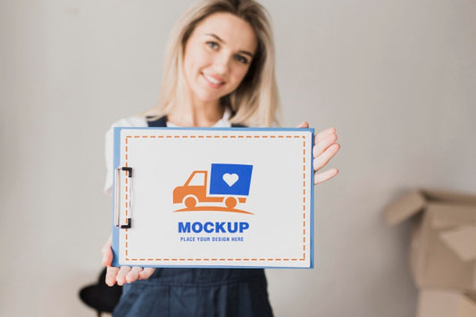 Free Smiley Woman Holding Clipboard Mockup Psd