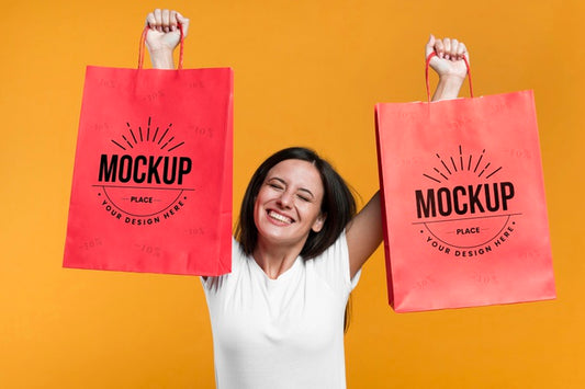 Free Smiley Woman Holding Shopping Bags Mock-Up Psd