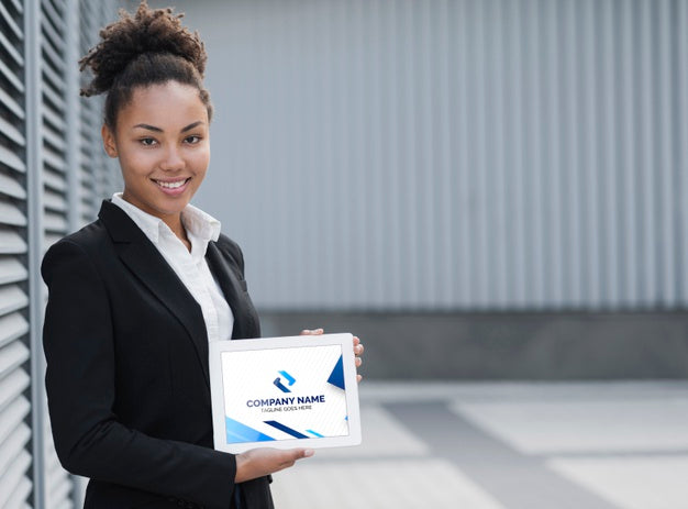 Free Smiling Business Woman Holding Tablet Mock-Up Psd