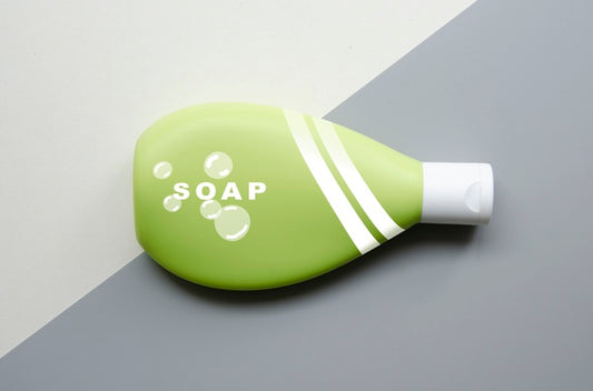 Free Soap Bottle On Bicolored Background Psd