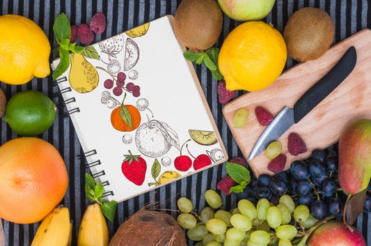Free Spiral Notebook Mockup With Fruits Psd