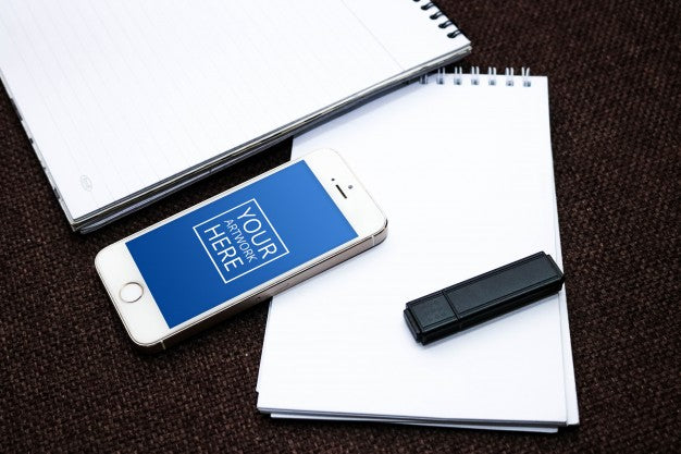 Free Spiral Notepad With Smartphone And Flash Drive Mockup Psd