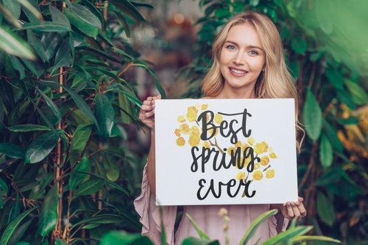Free Spring Concept With Woman Holding Paper Mockup Psd