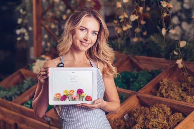 Free Spring Concept With Woman Holding Tablet Mockup Psd