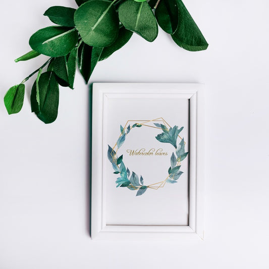 Free Spring Frame Mockup With Decorative Leaves In Top View Psd