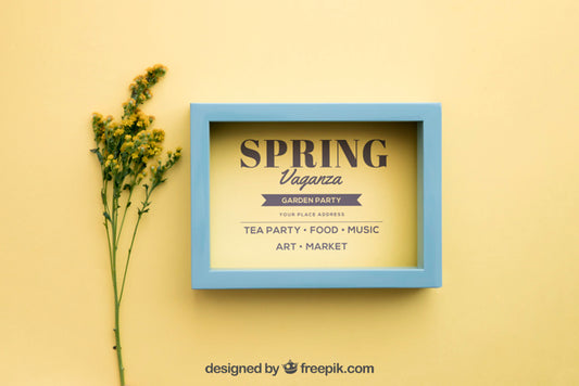 Free Spring Mock Up With Frame Next To Wildflowers Psd