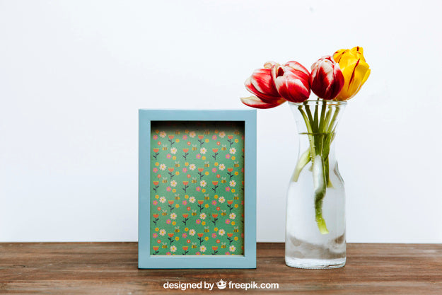 Free Spring Mockup With Blue Frame And Vase Of Flowers Psd