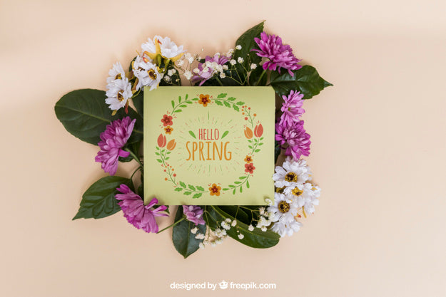 Free Spring Mockup With Card On Flowers Psd