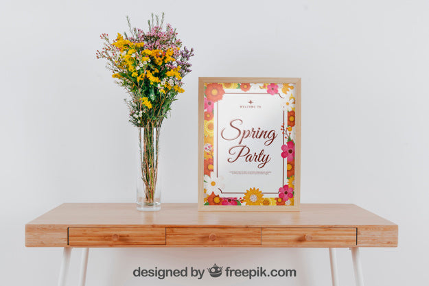 Free Spring Mockup With Frame And Vase Of Flowers Over Table Psd