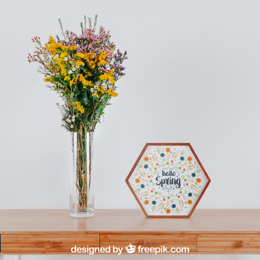 Free Spring Mockup With Hexagonal Frame And Vase Of Flowers Over Table Psd