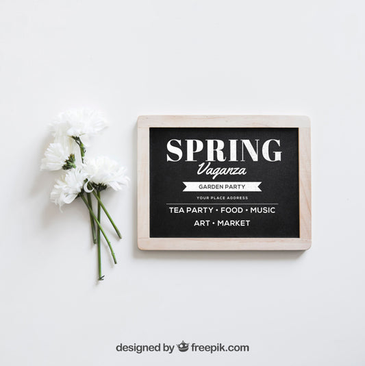 Free Spring Mockup With White Flowers Next To Slate Psd