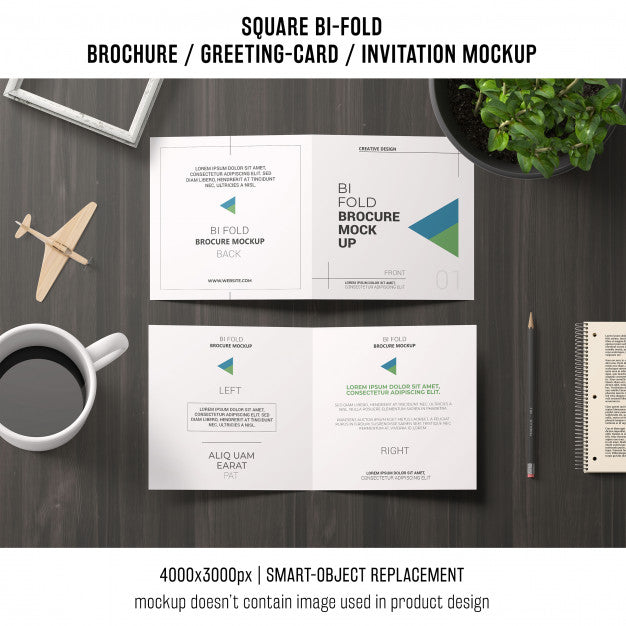 Free Square Bi-Fold Brochure Or Greeting Card Mockup On Workspace Psd
