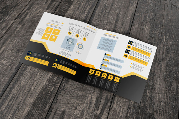 Free Square Brochure Mockup On Wooden Surface Psd